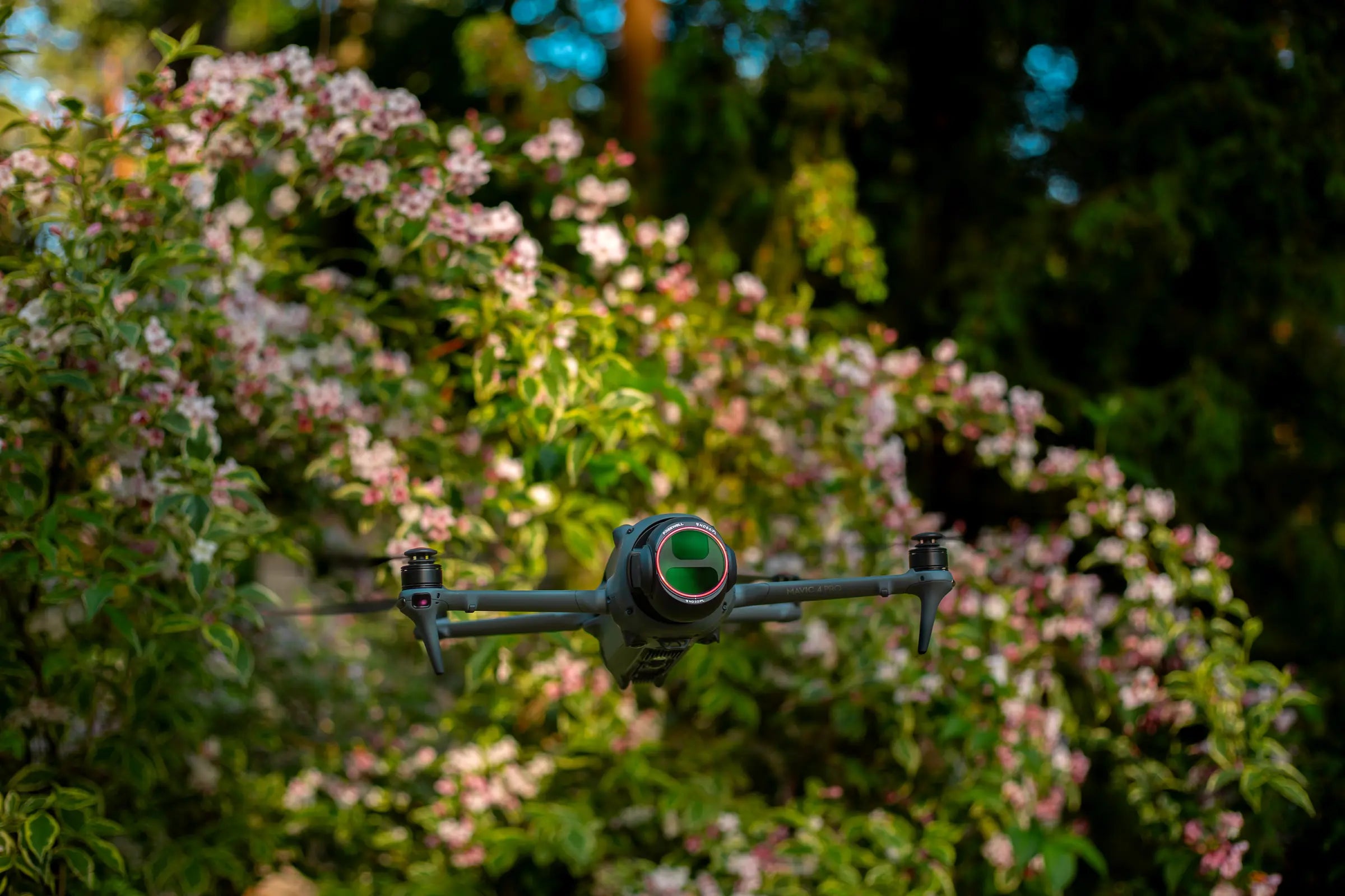 DJI Mavic 4 Pro flying with a Freewell filter