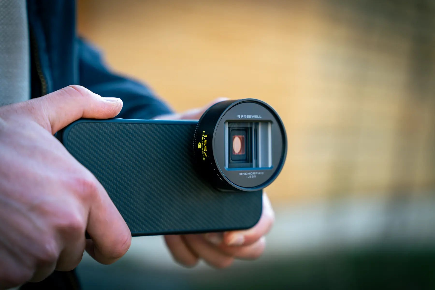 Freewell 1.55x anamorphic lens mounted on a smartphone case