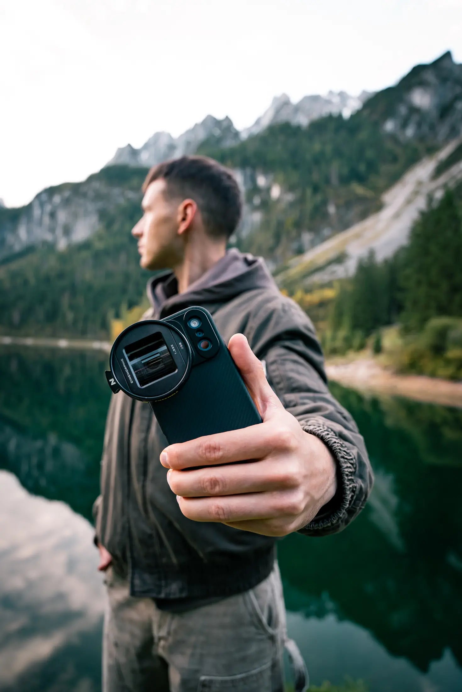 Creator filming outdoors with an iPhone and Freewell lens system