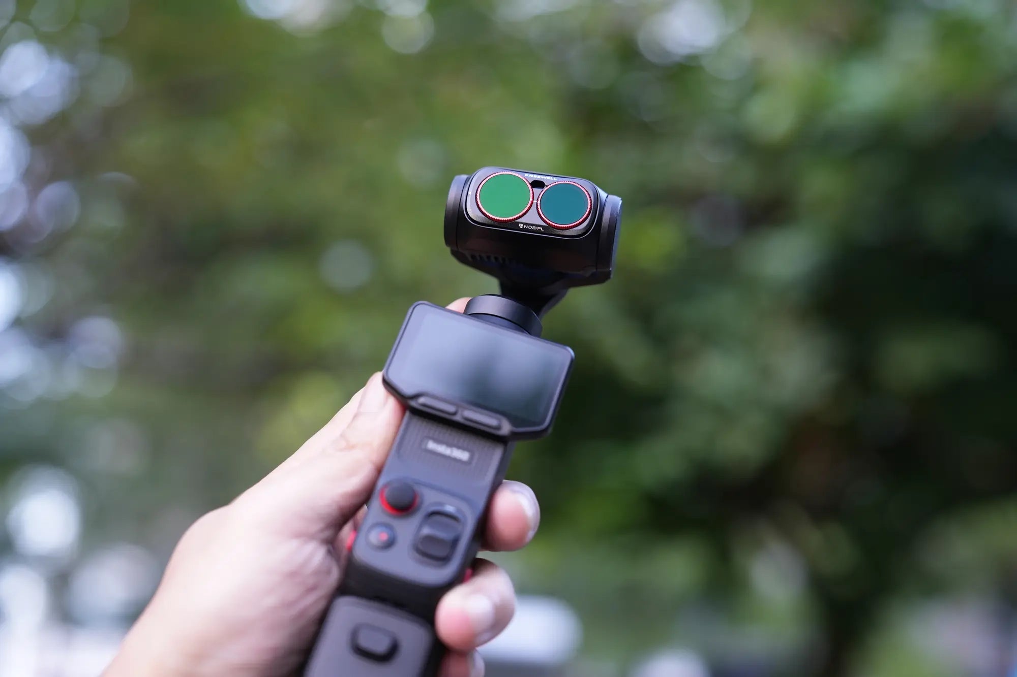 Handheld Insta360 Luna Ultra with Freewell ND PL filters outdoors