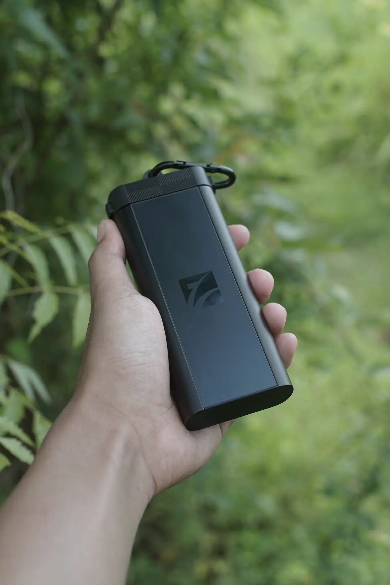 Compact Freewell Duo Reader held in one hand