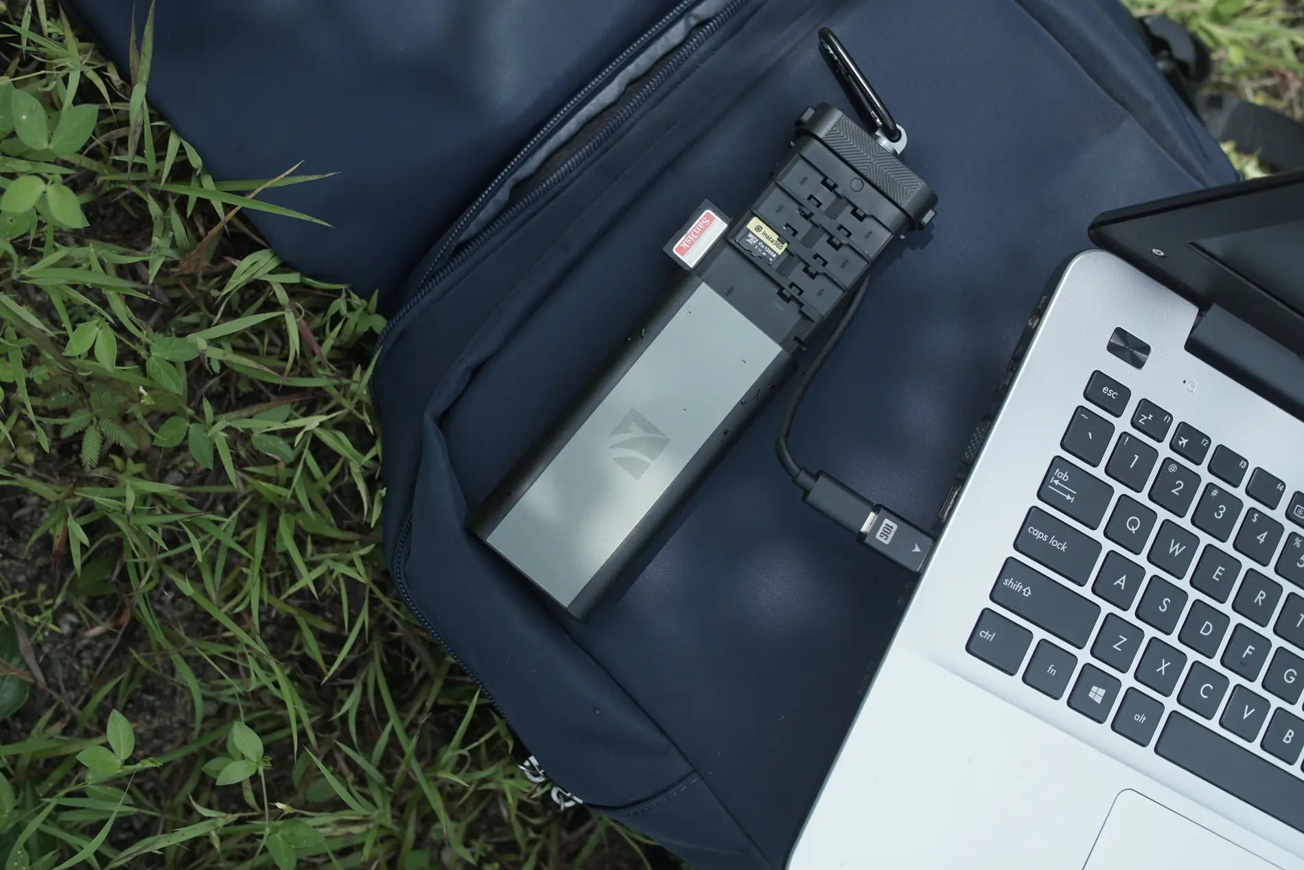 Duo Reader connected to a laptop during an outdoor backup