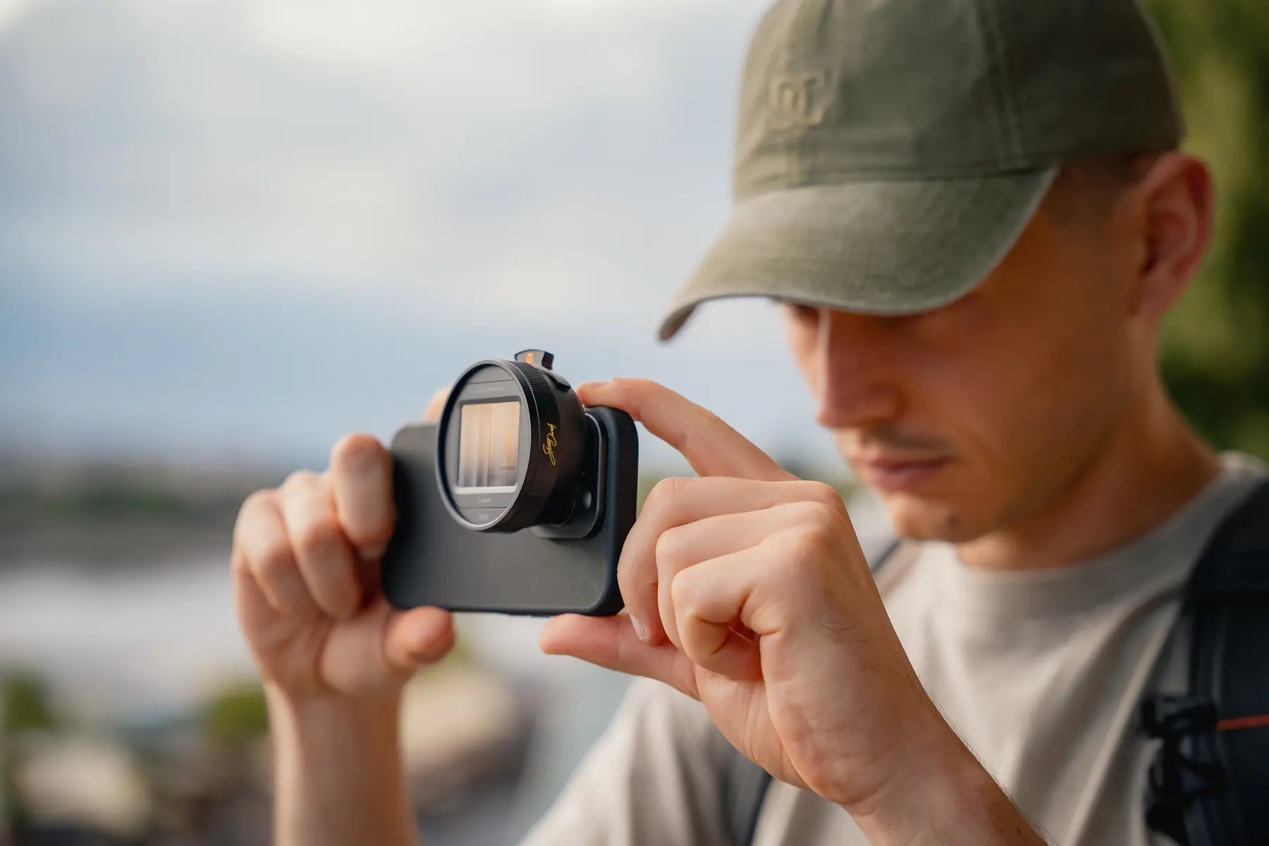 Filmmaker composing a smartphone shot