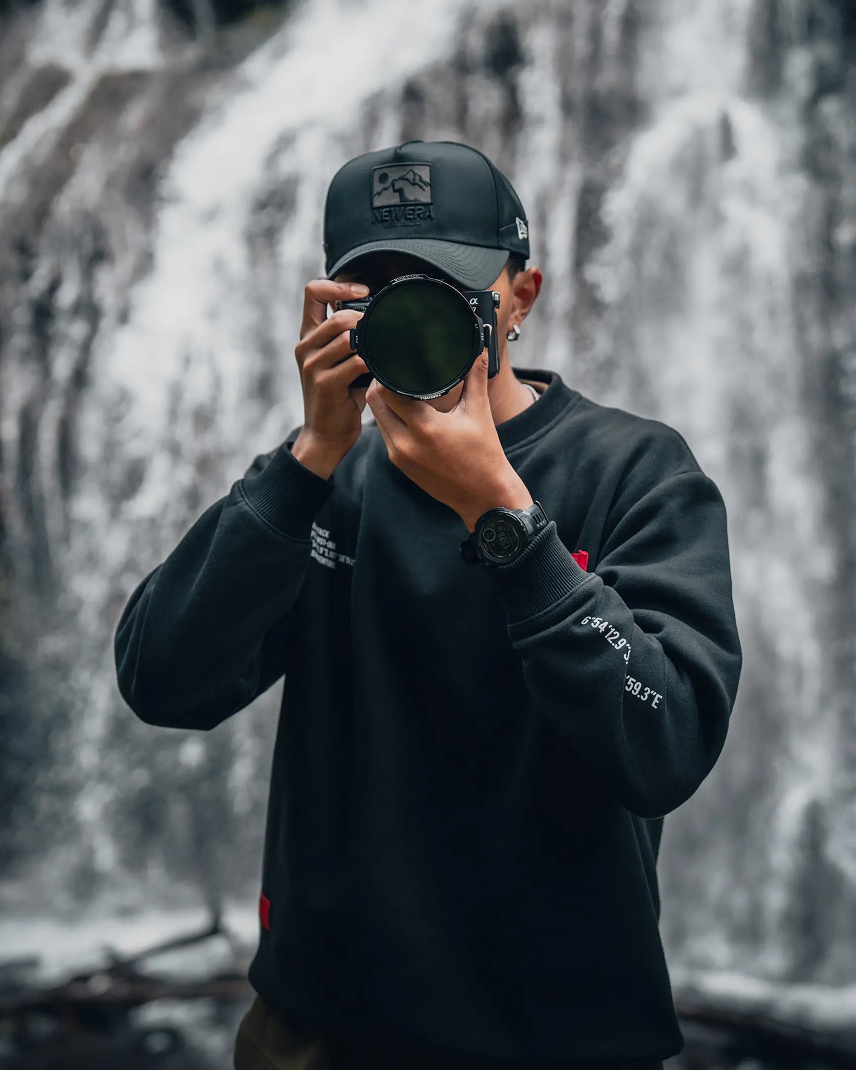 Filmmaker using the Freewell Real Locking filter in a green forest