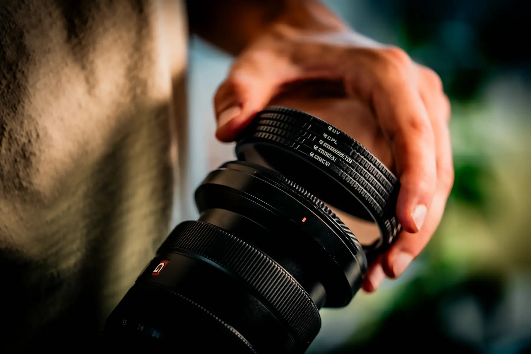 M2 magnetic filter attached to a camera lens outdoors