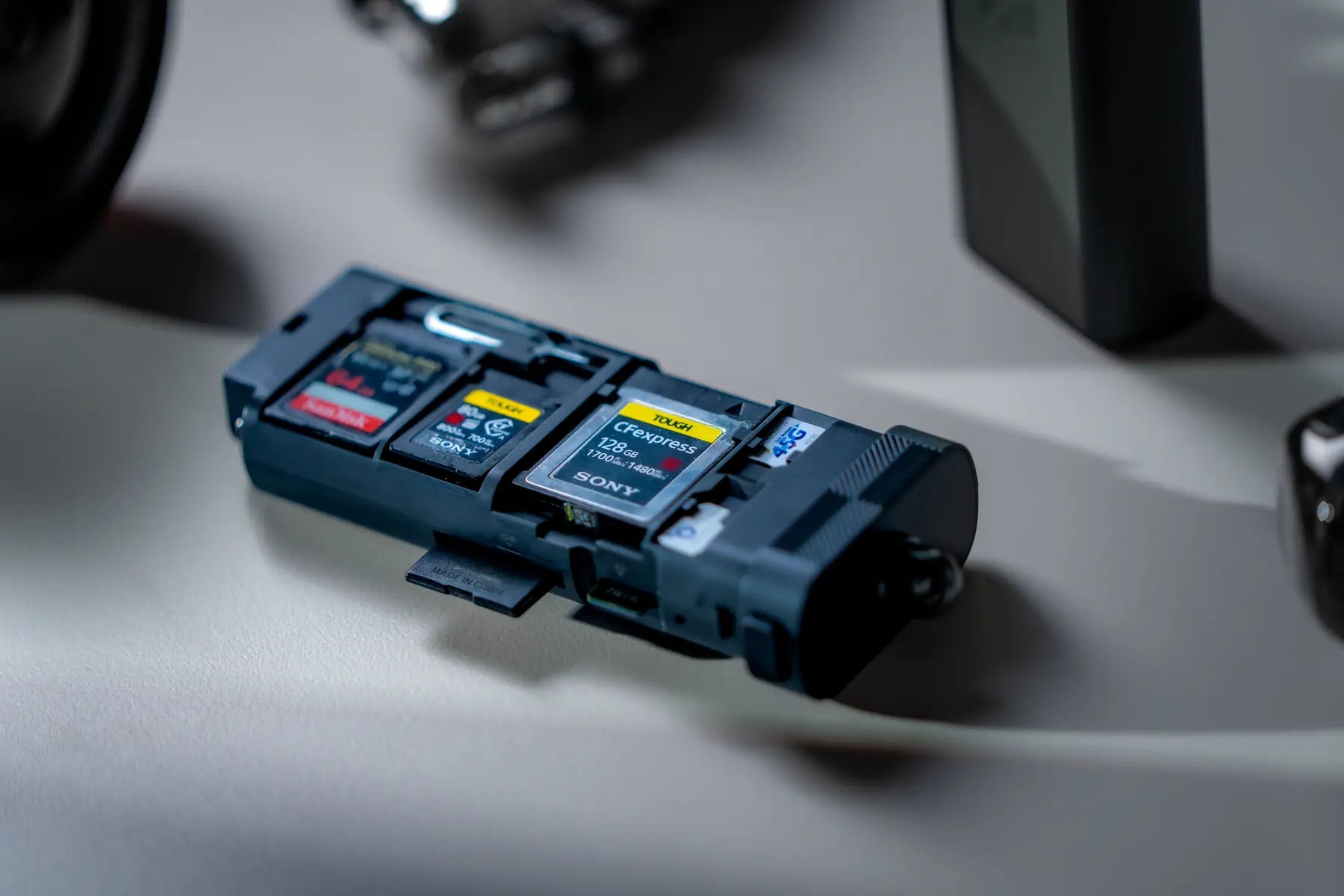 Open Freewell Pro Reader holding CFexpress Type A, CFexpress Type B, SD and microSD cards