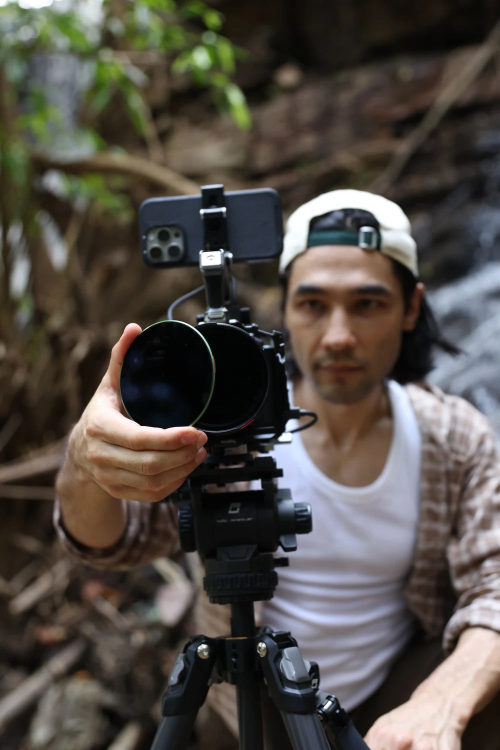 Brandon Li demonstrating the VND/CPL filter on a camera