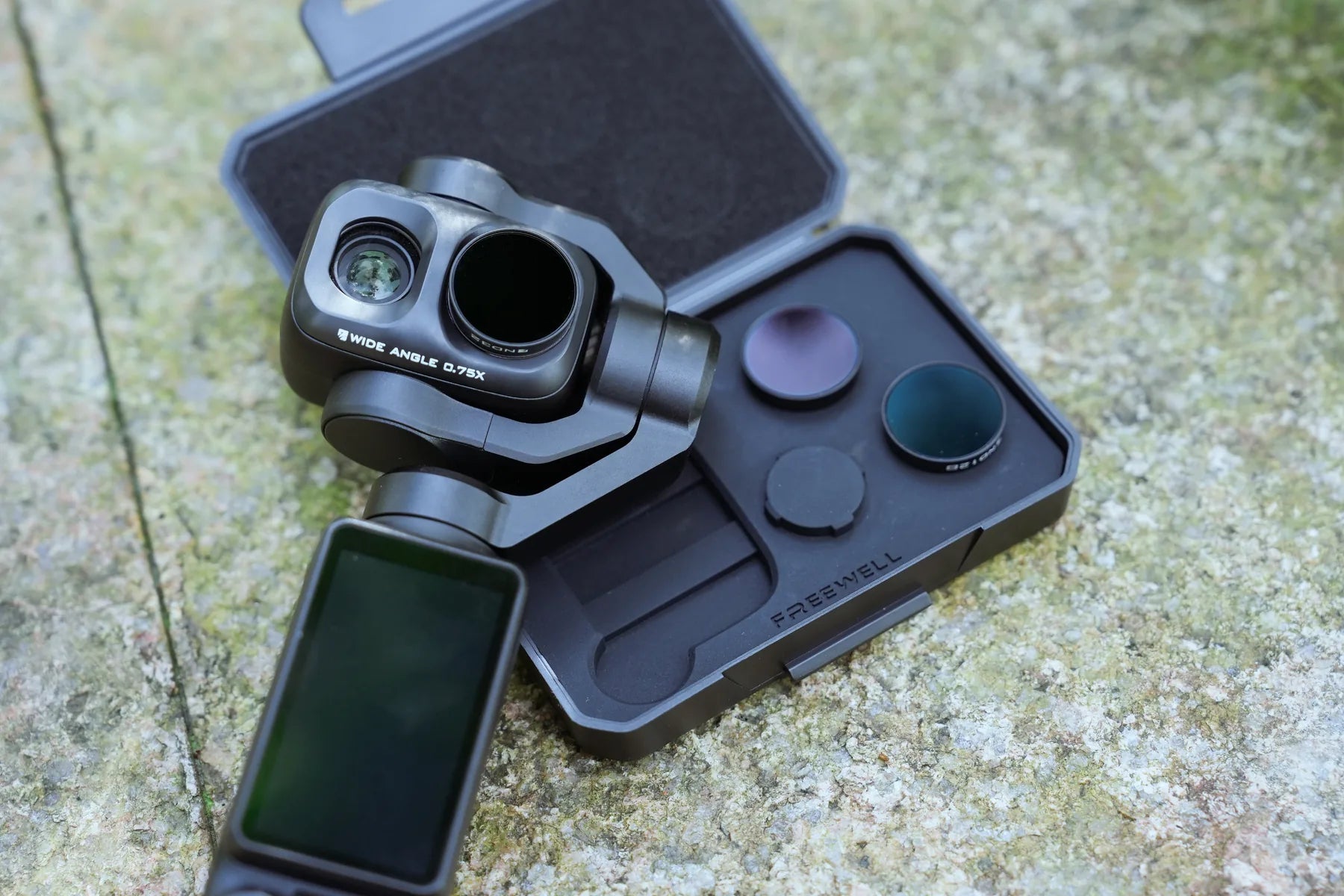 DJI Osmo Pocket 4P wide-angle lens kit arranged outdoors