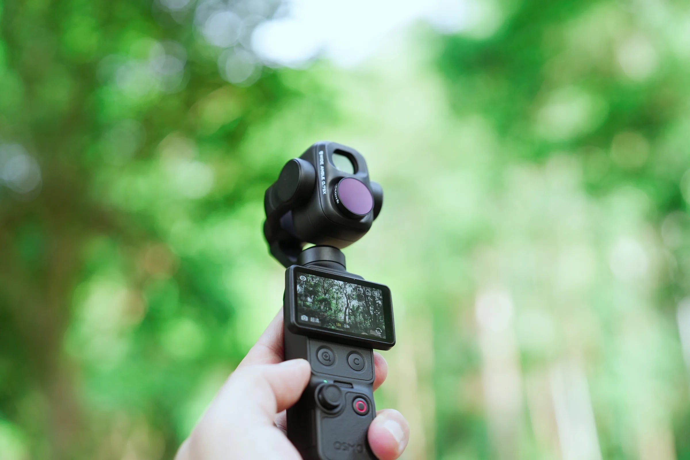 DJI Osmo Pocket 4P fitted with the Freewell 0.75x wide-angle lens and an ND filter