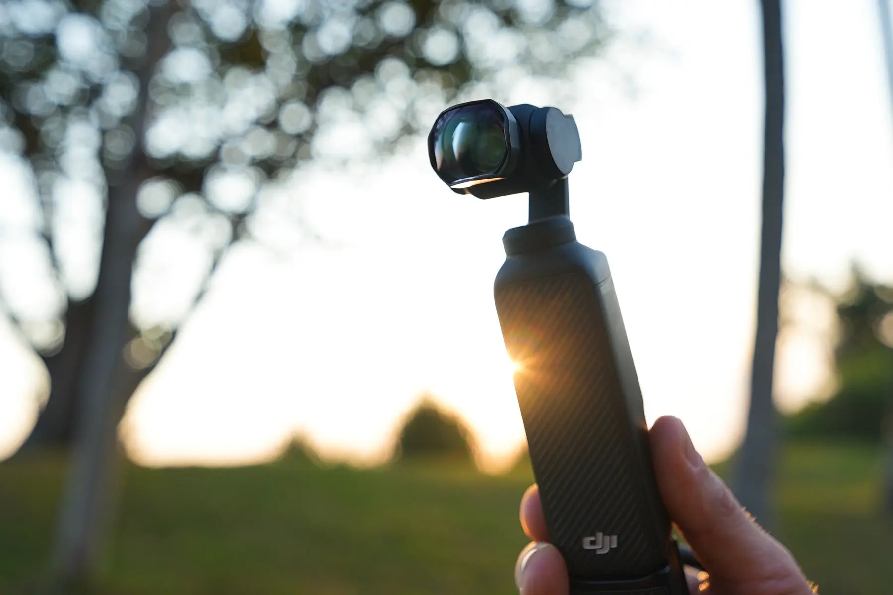 DJI Osmo Pocket camera fitted with the Freewell 2x telephoto lens