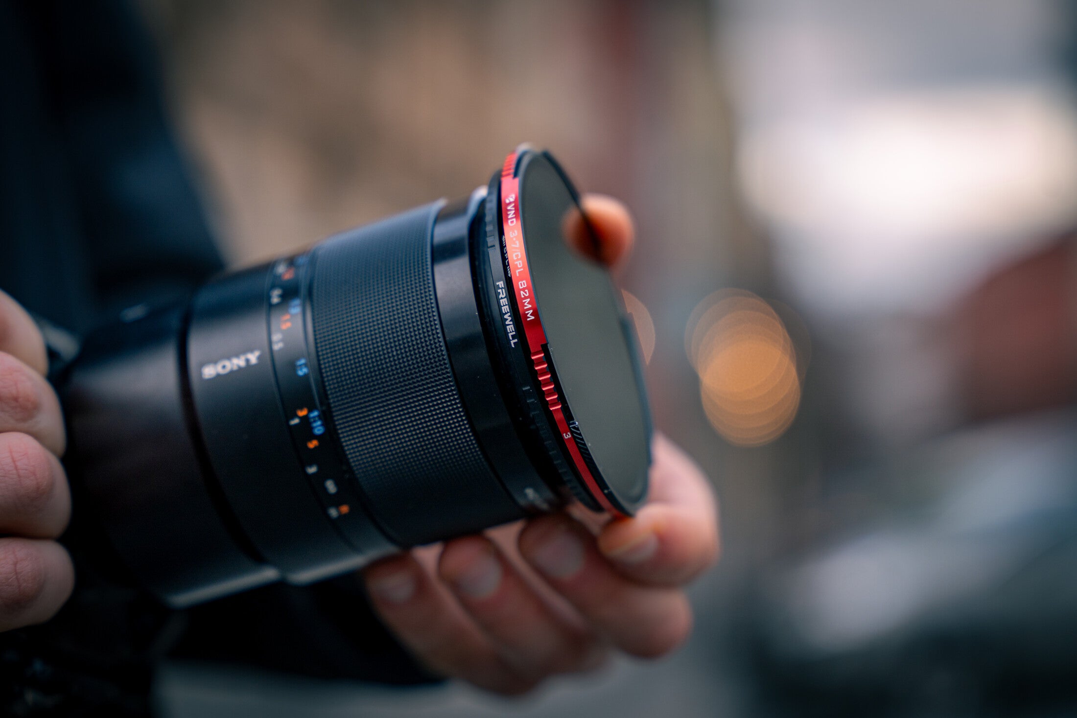 Close view of the hybrid variable ND and CPL filter mounted on a camera lens