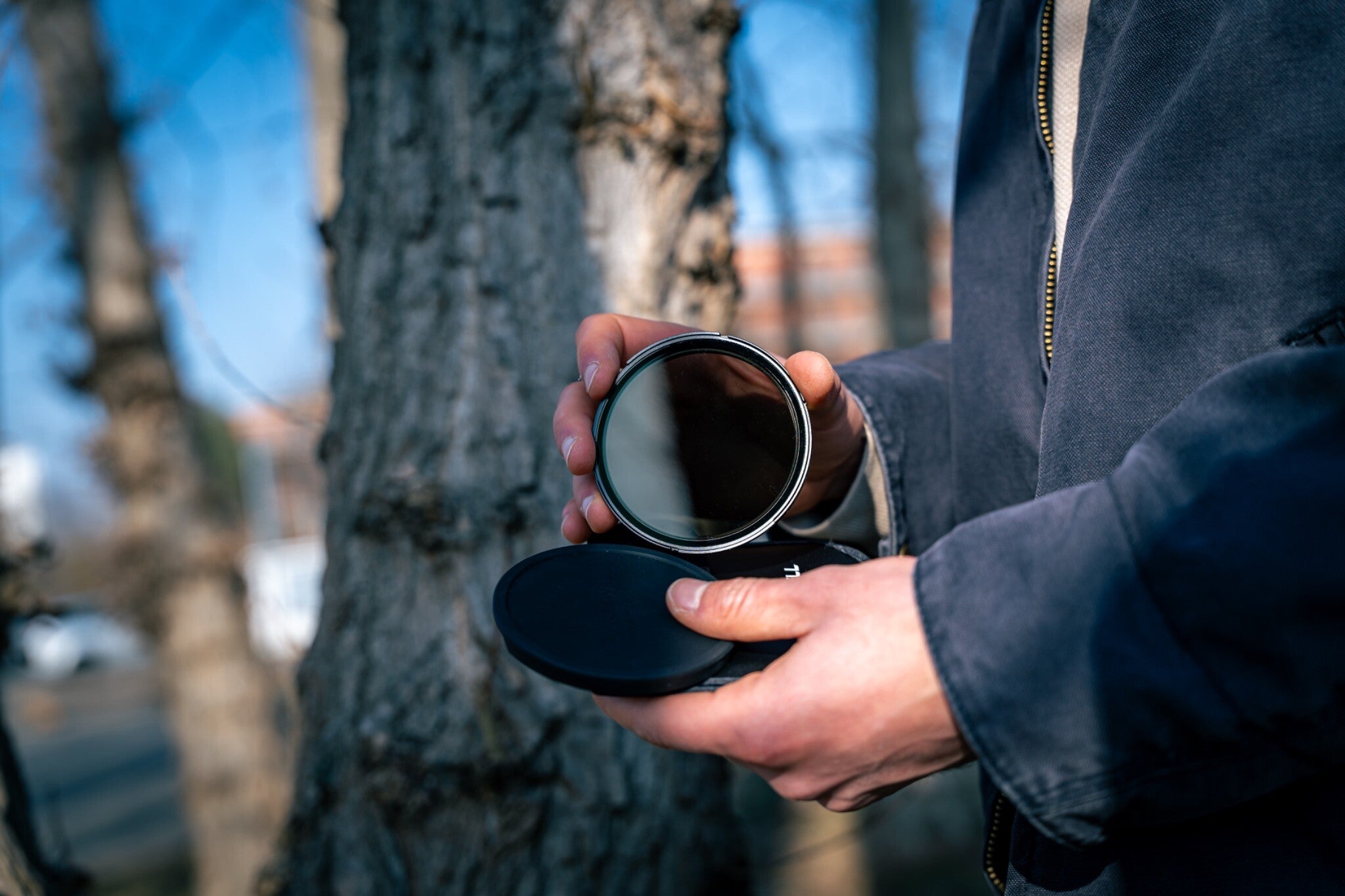 Freewell hybrid VND and CPL filter being placed into its protective pouch