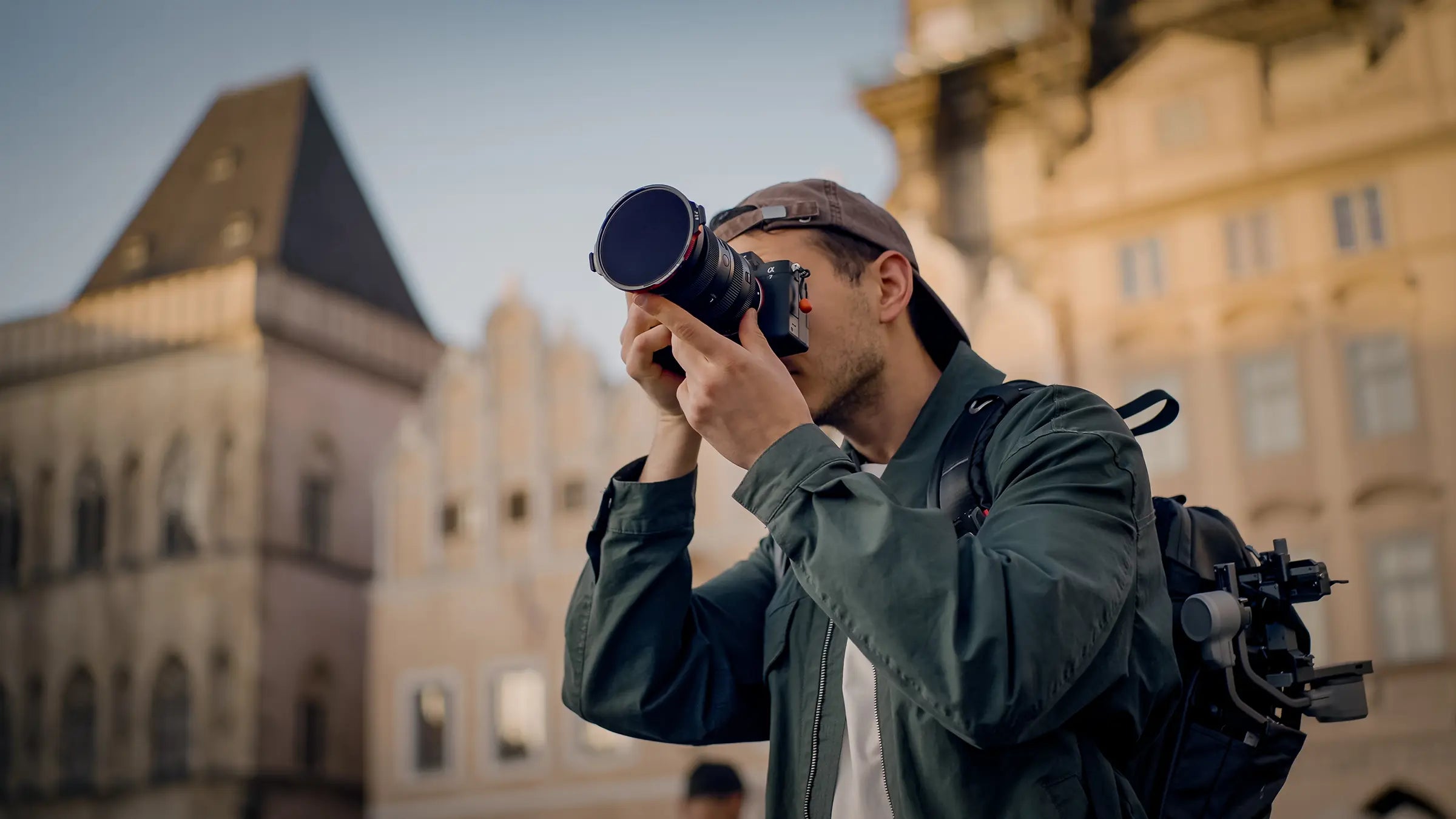 Filmmaker shooting with the Freewell Real Locking VND/CPL filter mounted on a camera