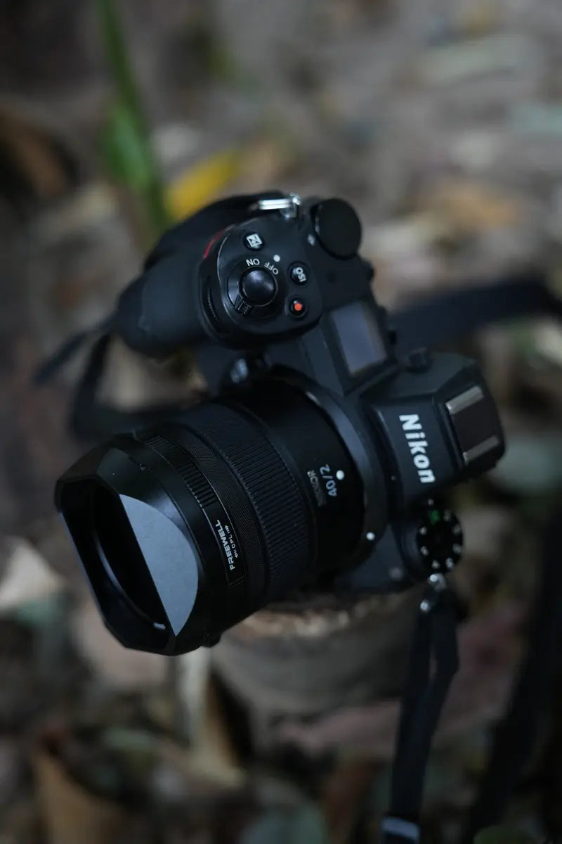 Close-up of Nikon camera and Freewell Real Lens Hood in outdoor light